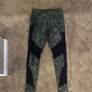 Puma Black and Heather Gray Performance Leggings with Gold Puma Logo